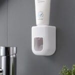 Automatic toothpaste squeezer wall-mounted no-drill lazy installation daily necessities quantitative extruder back sticker simple toothpaste holder - Image 3